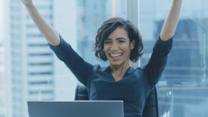 Woman creating a statement of cashflow on her computer